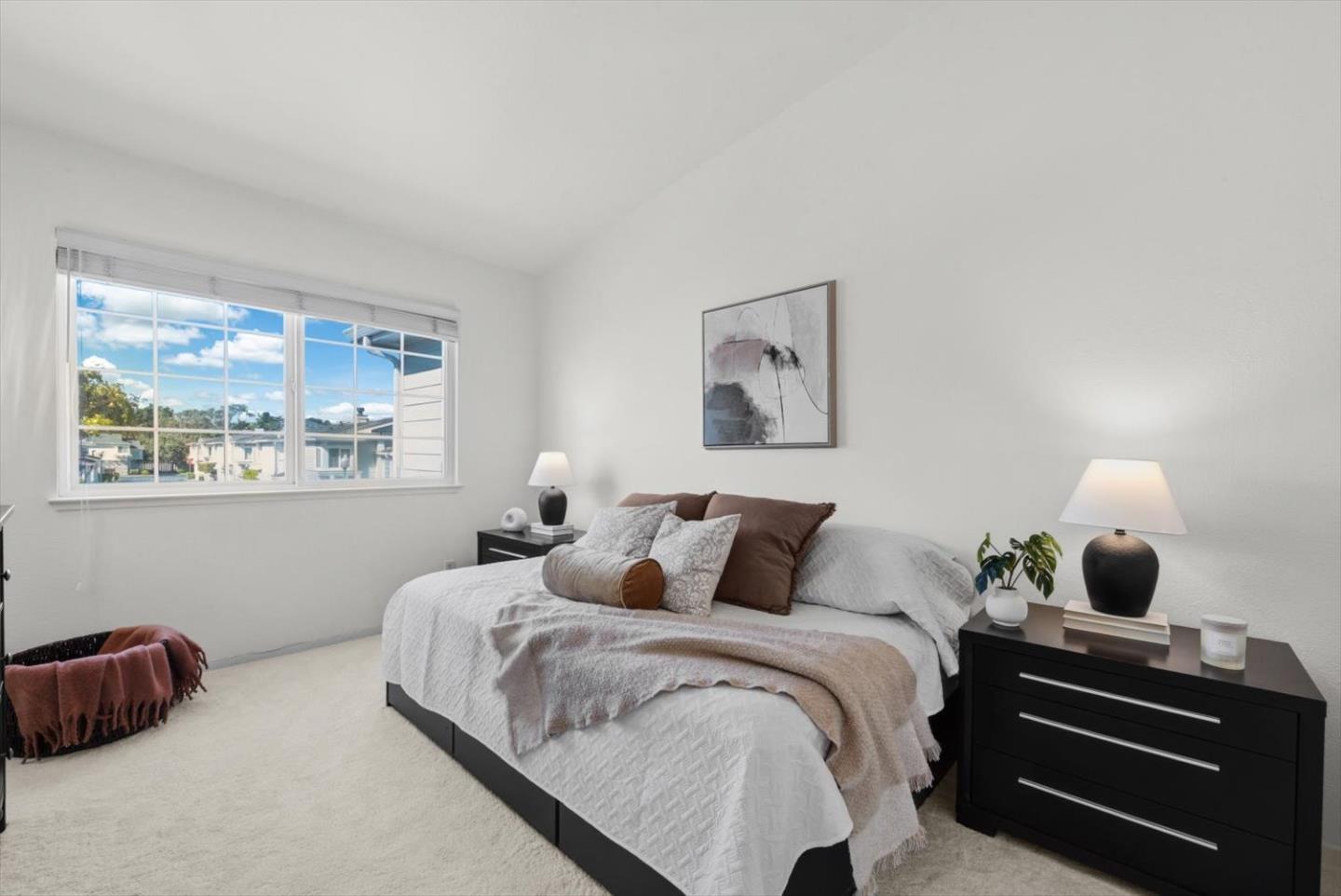 129 Outlook Circle Pacifica, CA 94044 - Photo 33 of 52 a bedroom with a bed and a window