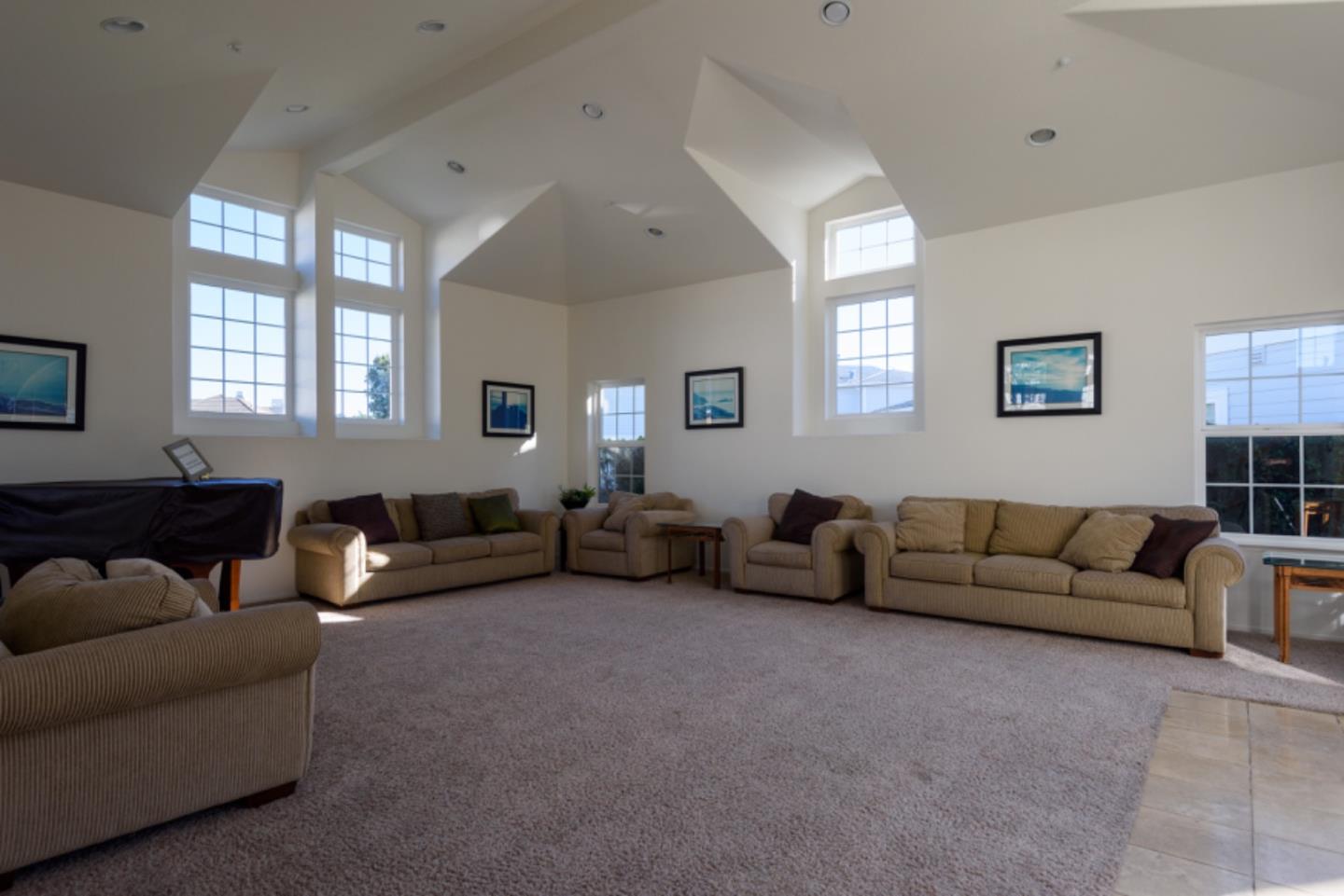 129 Outlook Circle Pacifica, CA 94044 - Photo 38 of 52 a living room with furniture and a couch