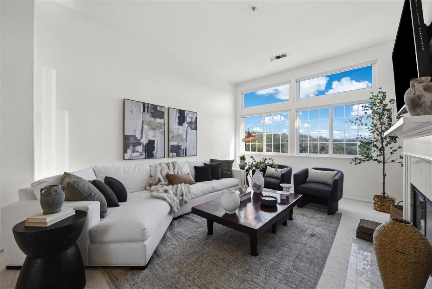 129 Outlook Circle Pacifica, CA 94044 - Photo 7 of 52 a living room with furniture a large window and a flat screen tv
