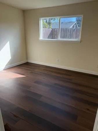 a view of a room that has a window in it