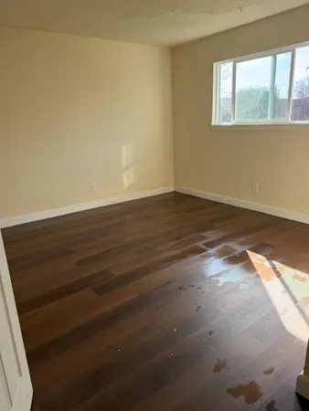 a view of an empty room and window