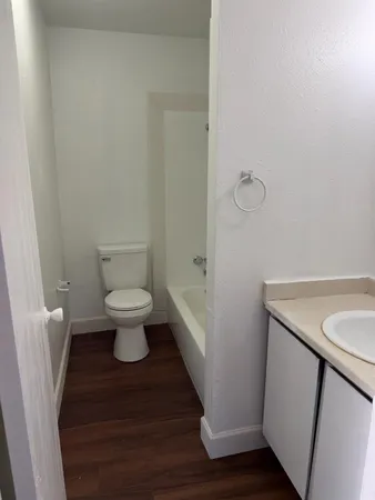 a bathroom with a sink and a toilet