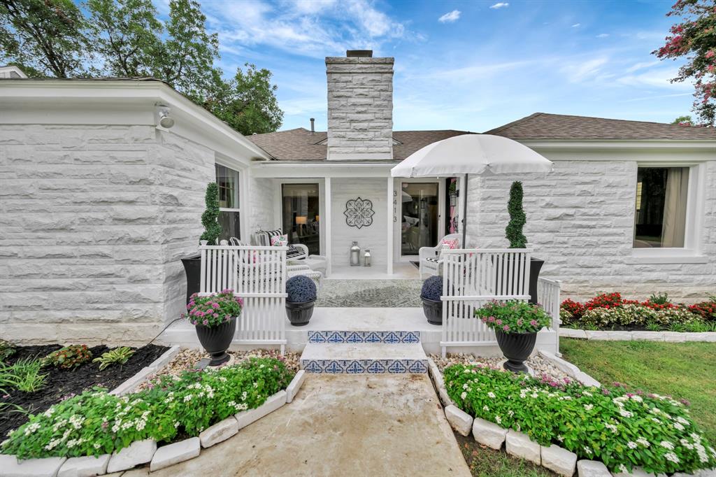 3413 Westcliff Road South Fort Worth, TX 76109 - Photo 1 of 26 a front view of a house with a garden