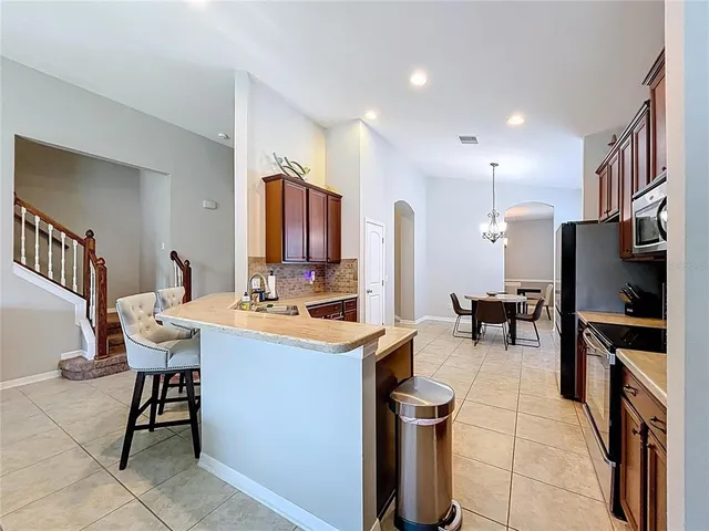 a bedroom with a bed and a cabinets