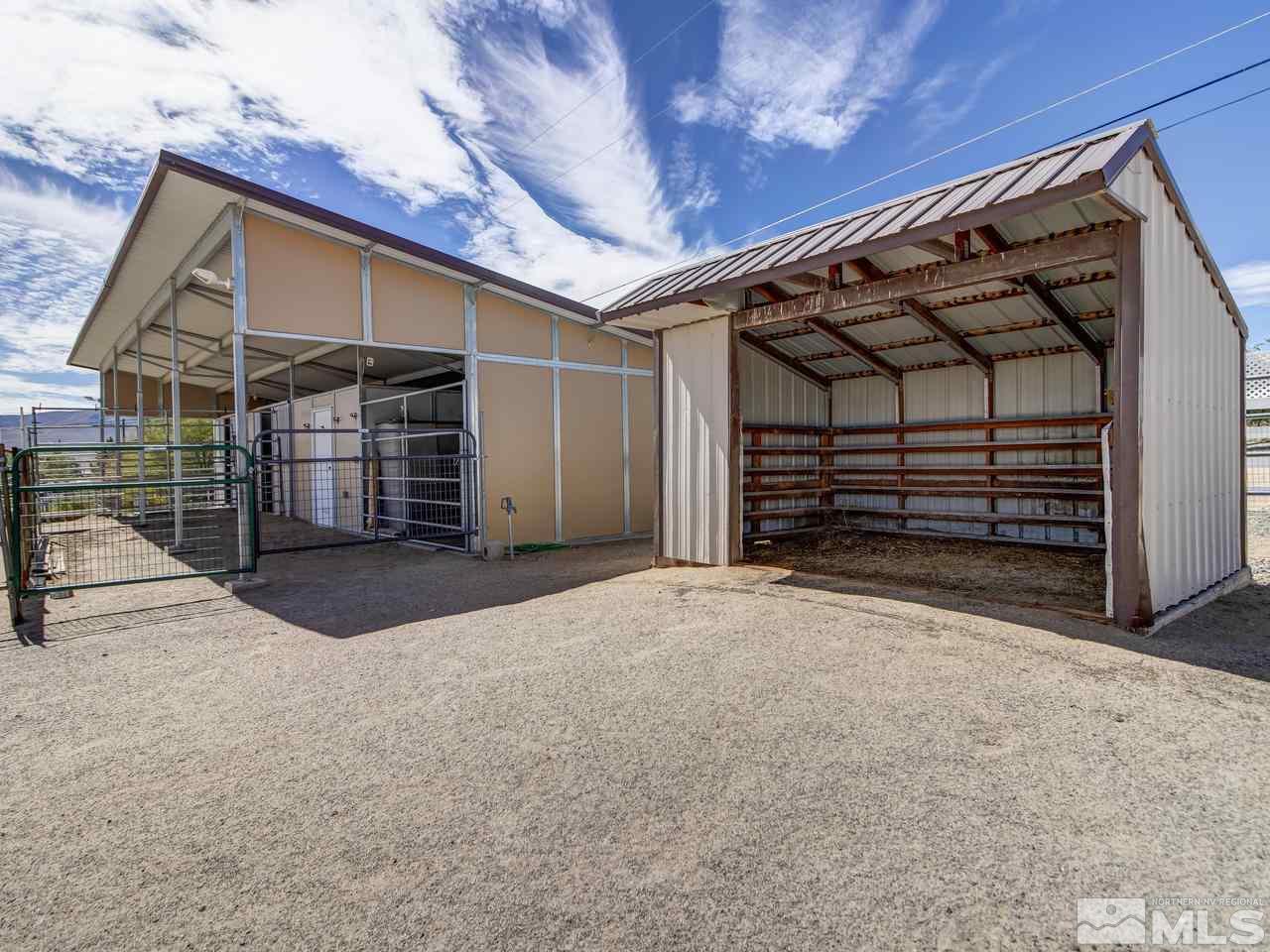 11495 Carlsbad Road Reno, NV 89508 - Photo 24 of 25 a view of an empty room with wooden walls