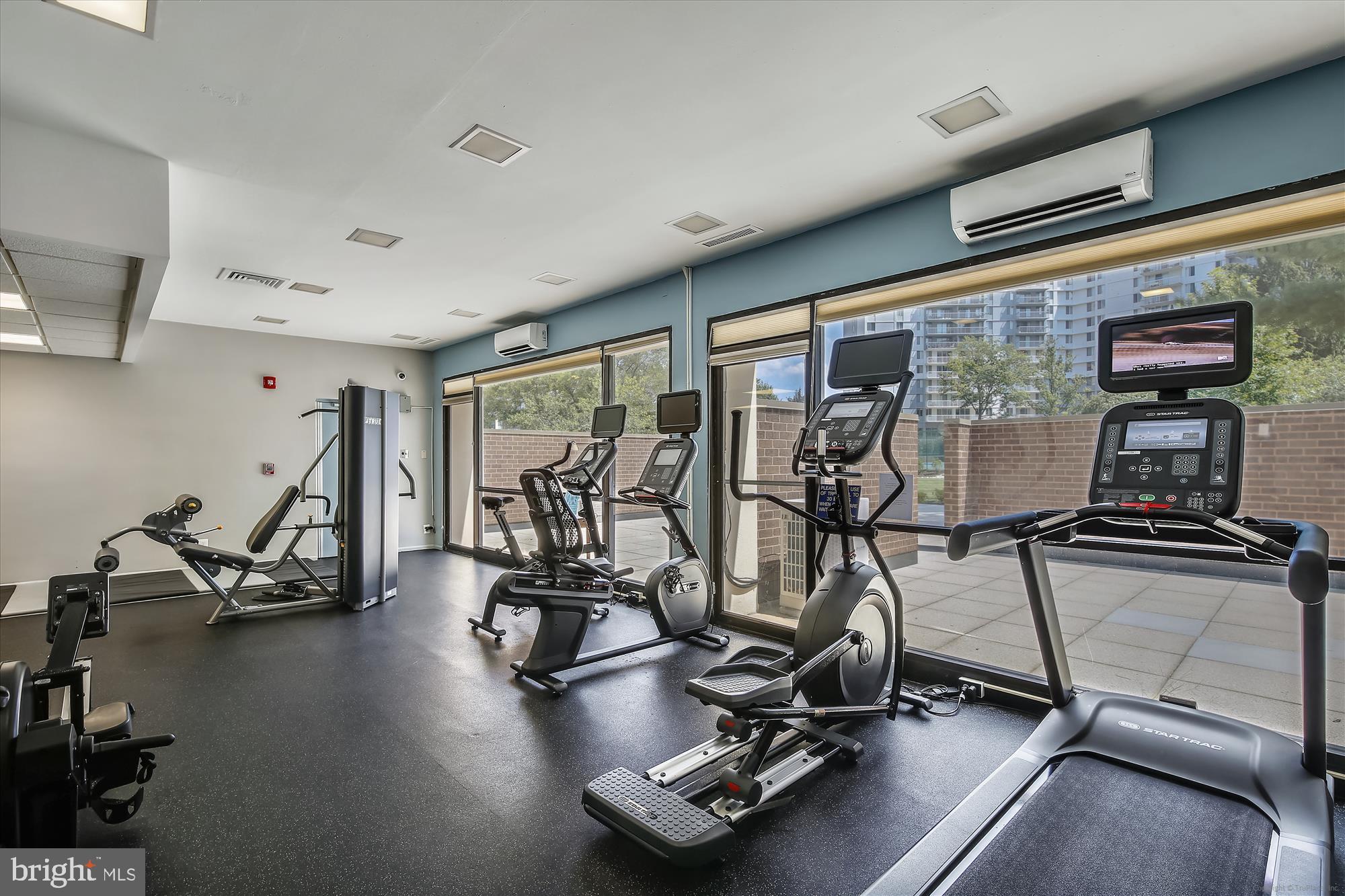 6800 Fleetwood Road, Unit 1004 McLean, VA 22101 - Photo 28 of 40 Modern fitness center with expansive views.
