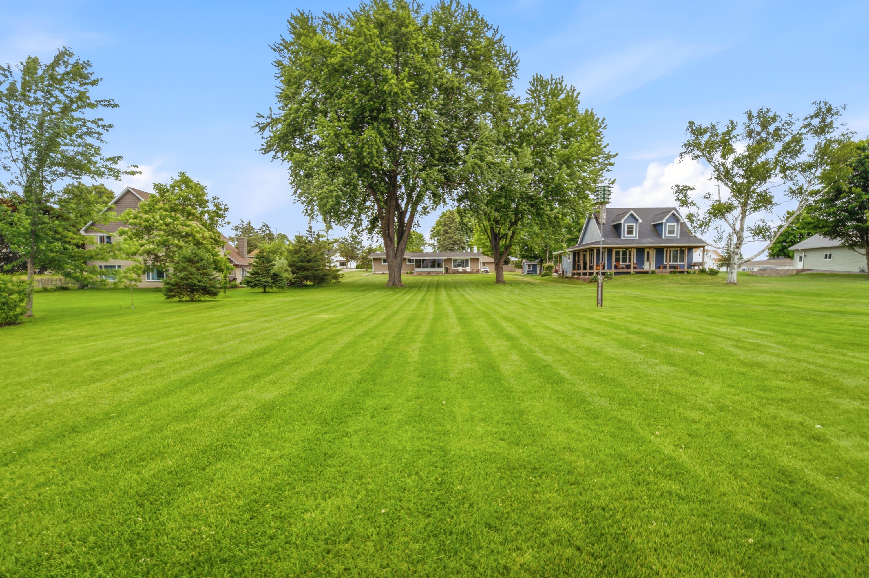 6121 Black Wolf Point Road Black Wolf, WI 54902 - Photo 46 of 85 Back Yard View from Water