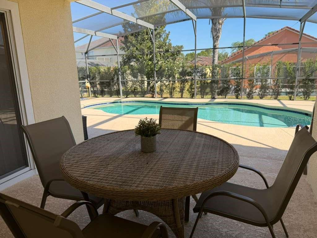 328 Robin Road Davenport, FL 33896 - Photo 5 of 17 a view of yard with outdoor seating