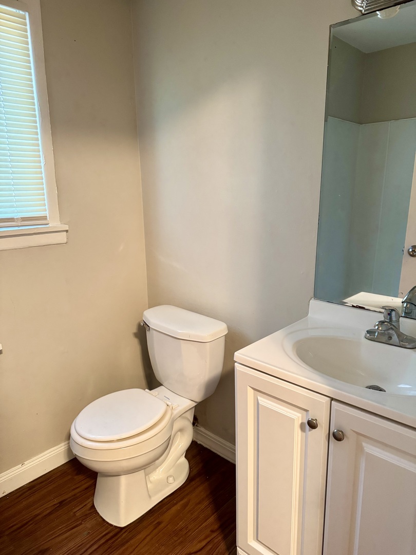 16919 Western Avenue Hazel Crest, IL 60429 - Photo 18 of 21 a bathroom with a toilet and a sink