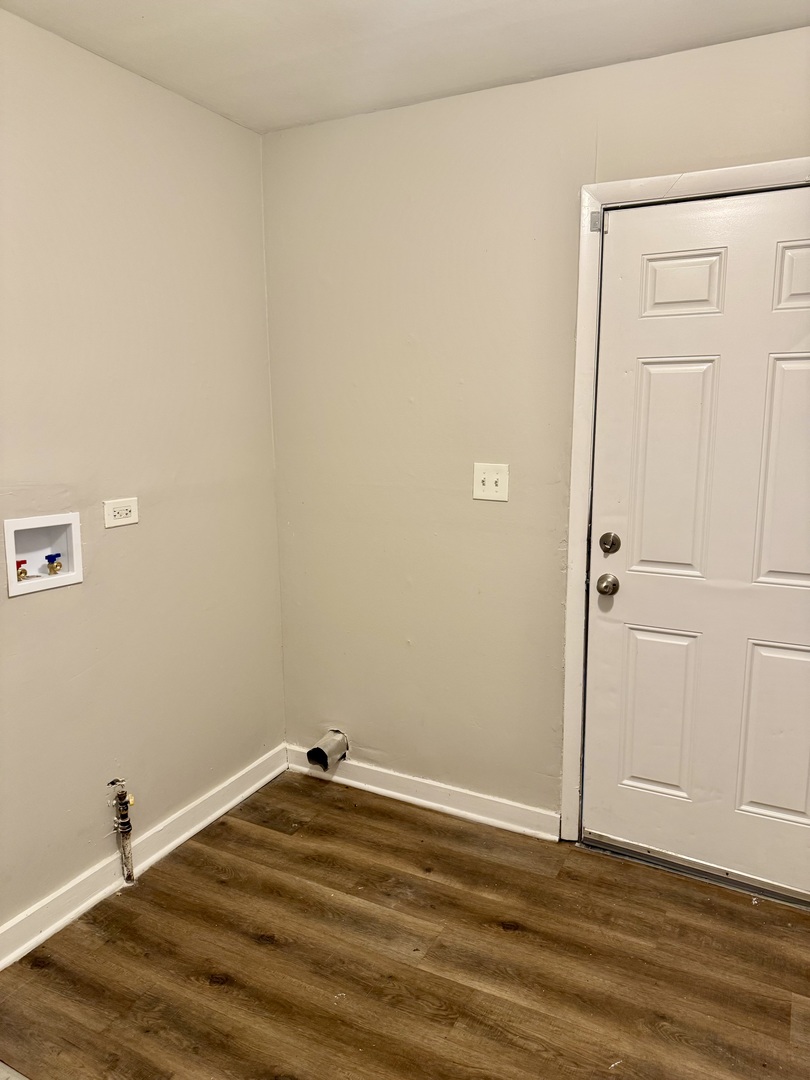 16919 Western Avenue Hazel Crest, IL 60429 - Photo 8 of 21 a view of a room with wooden floor and a sink