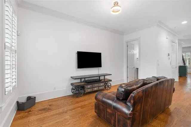 a bathroom with a granite countertop sink mirror and bathtub