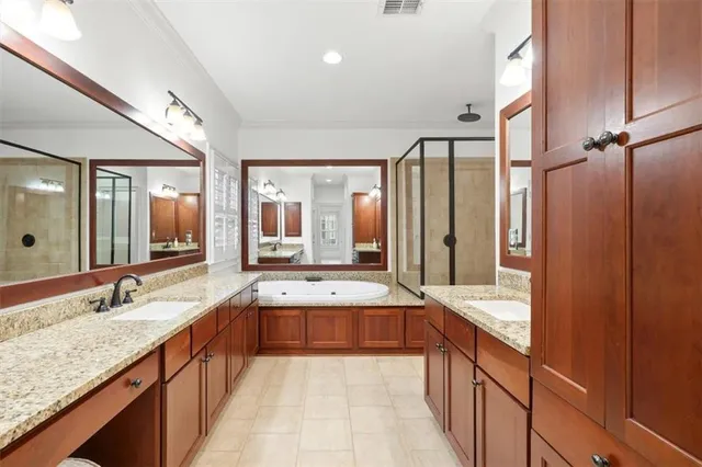 a view of a roof deck with furniture