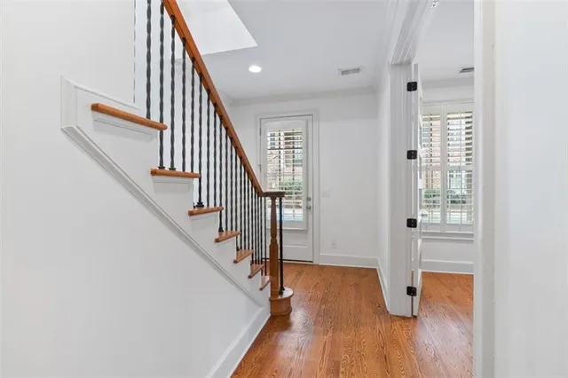 a living room with fireplace furniture and a flat screen tv
