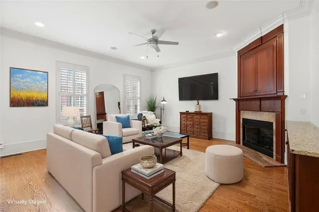 a kitchen with granite countertop a sink a counter space and cabinets