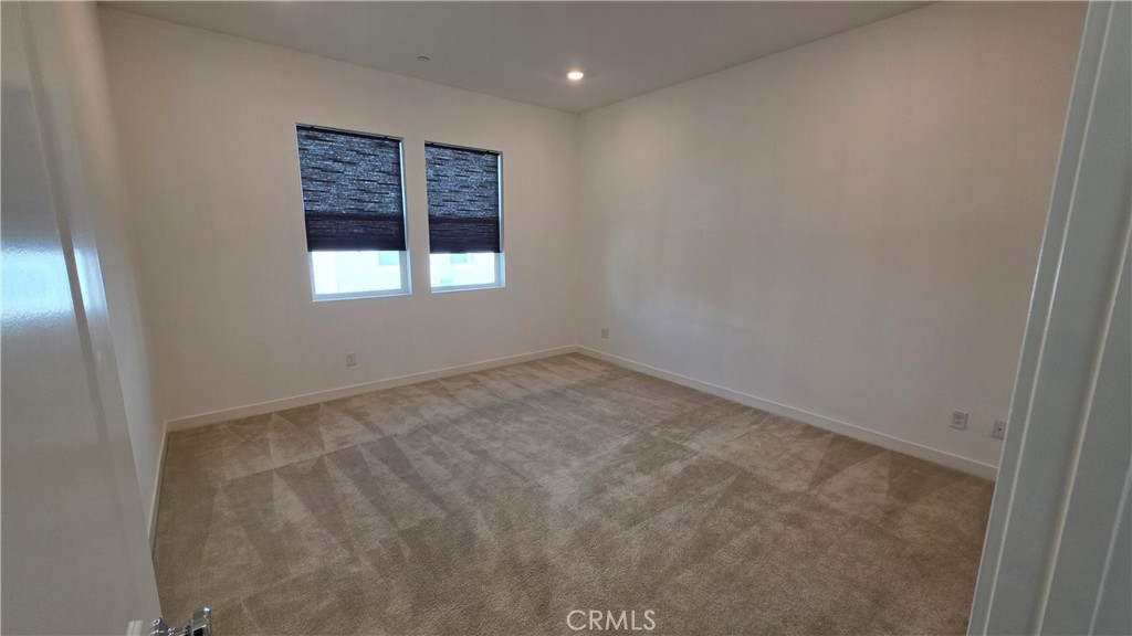 26955 West Prospector Road, Unit 201 Valencia, CA 91381 - Photo 13 of 30 an empty room with a window