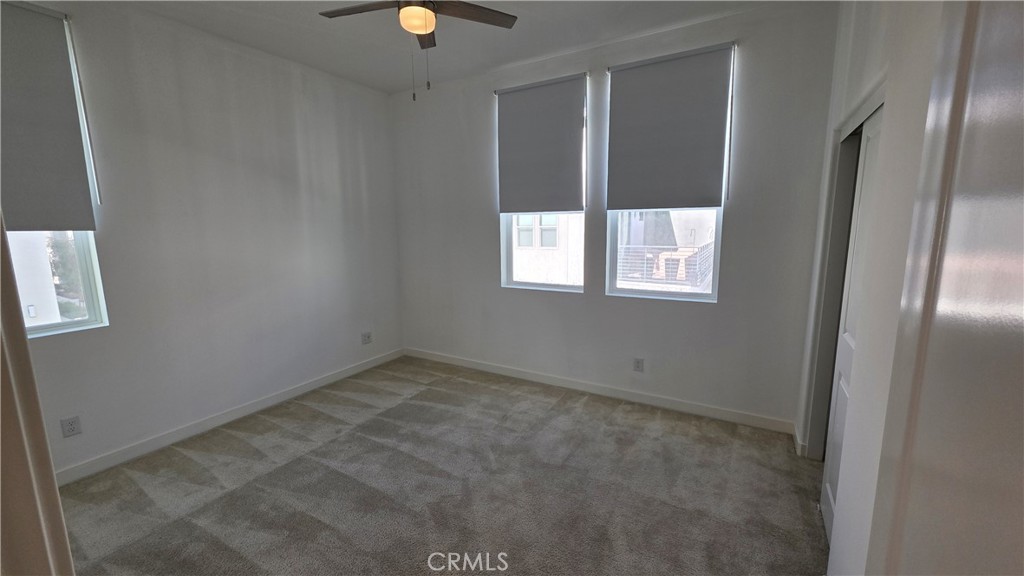 26955 West Prospector Road, Unit 201 Valencia, CA 91381 - Photo 21 of 30 a view of an empty room with a window