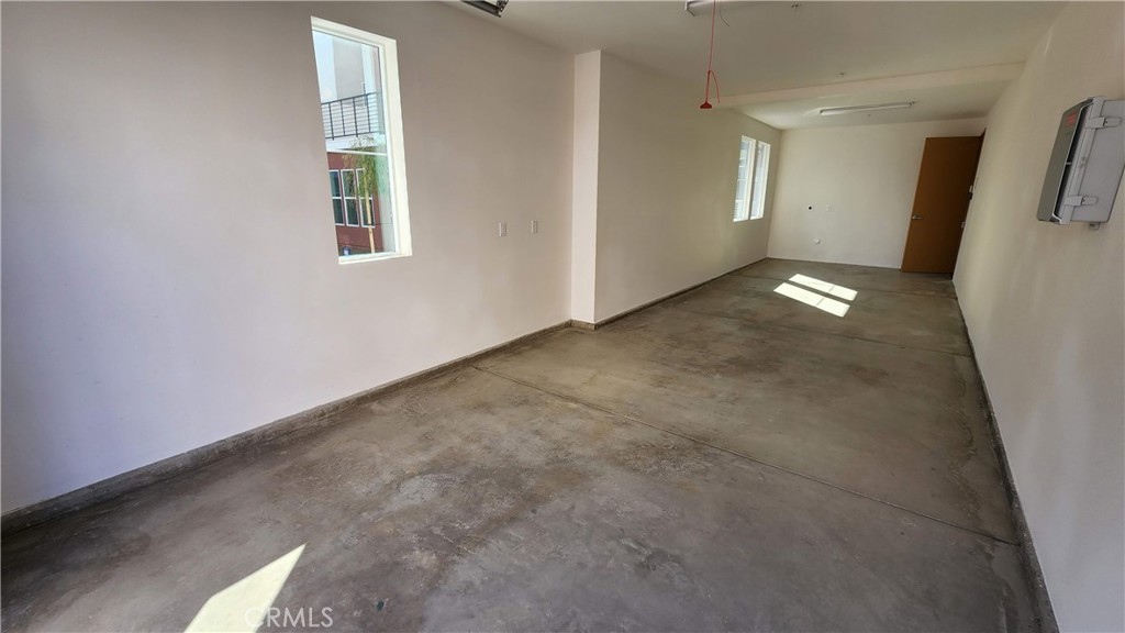26955 West Prospector Road, Unit 201 Valencia, CA 91381 - Photo 29 of 30 an empty room with windows
