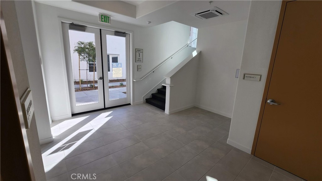 26955 West Prospector Road, Unit 201 Valencia, CA 91381 - Photo 30 of 30 a view of a hallway view with staircase