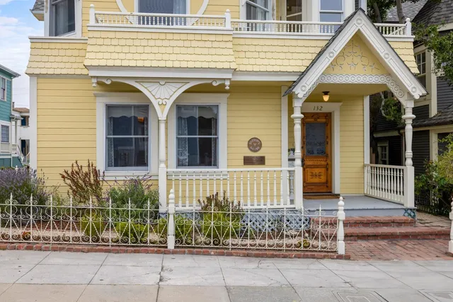 a view of a house with a small garden