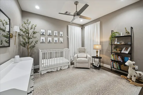 a bedroom with furniture and a bed