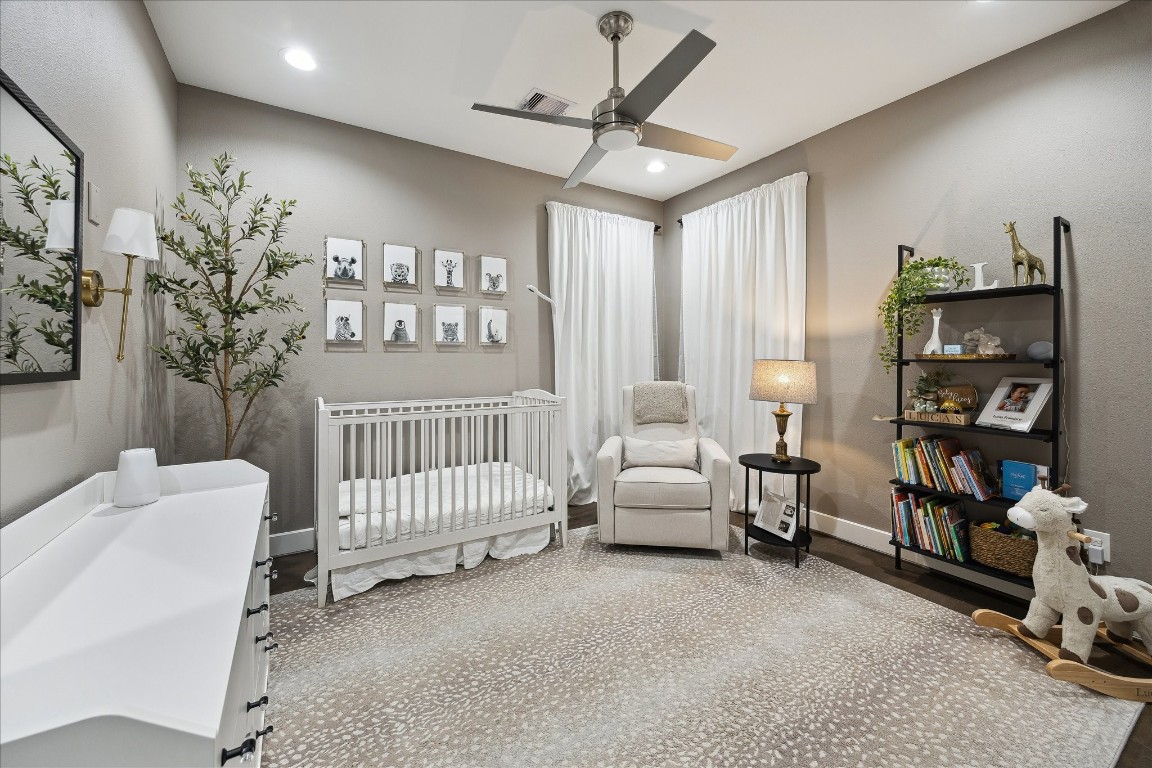 824 Morris Street Houston, TX 77009 - Photo 21 of 27 a bedroom with furniture and a bed