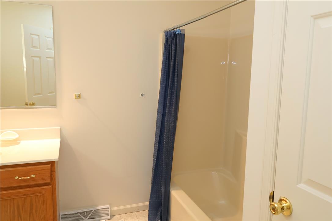 1282 Old Gate Road Northampton, PA 18067 - Photo 11 of 18 A well-maintained bathroom offering a classic shower-over-tub design with a functional vanity.
