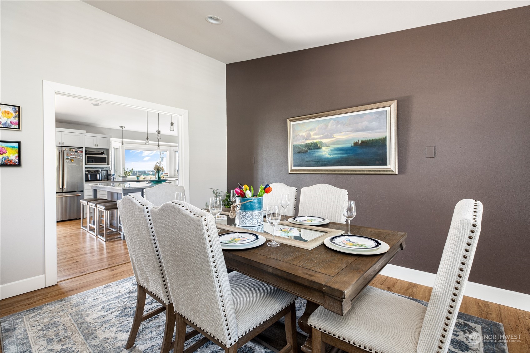 246 Lighthouse Way Freeland, WA 98249 - Photo 13 of 40 a view of a dining room with furniture