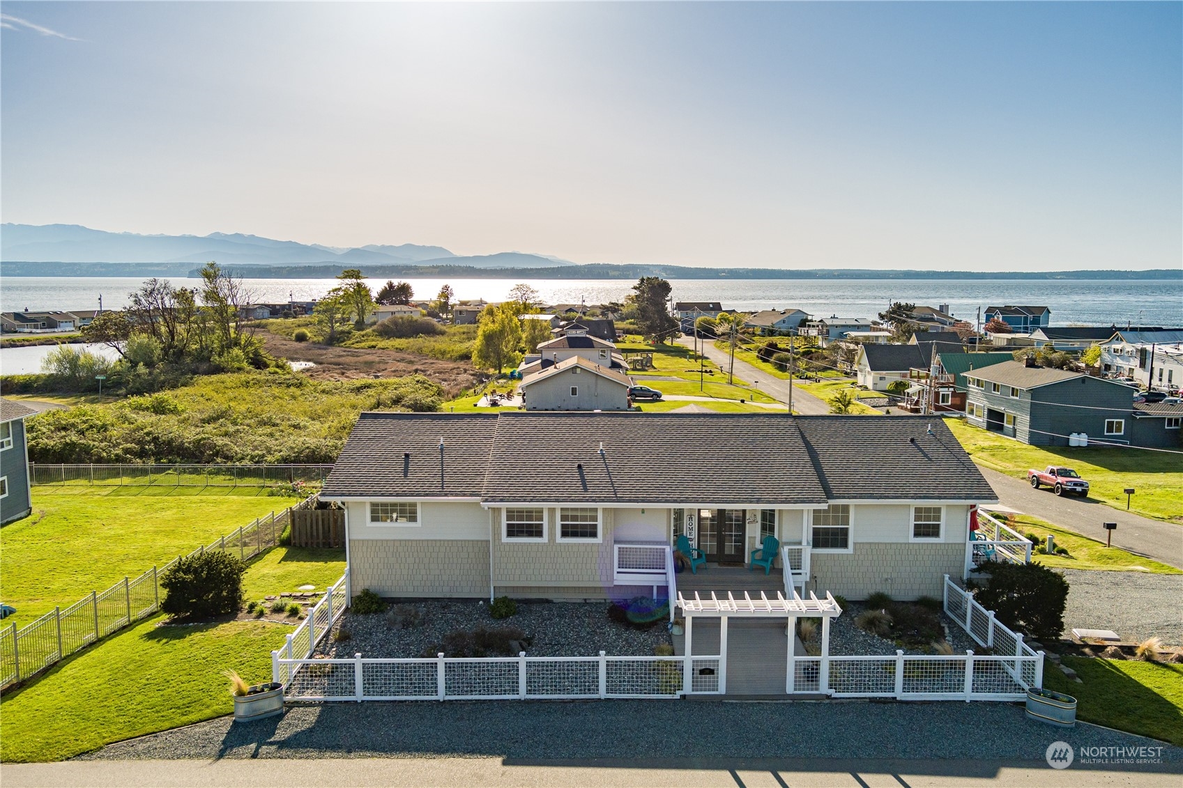 246 Lighthouse Way Freeland, WA 98249 - Photo 2 of 40 an aerial view of residential houses with outdoor space