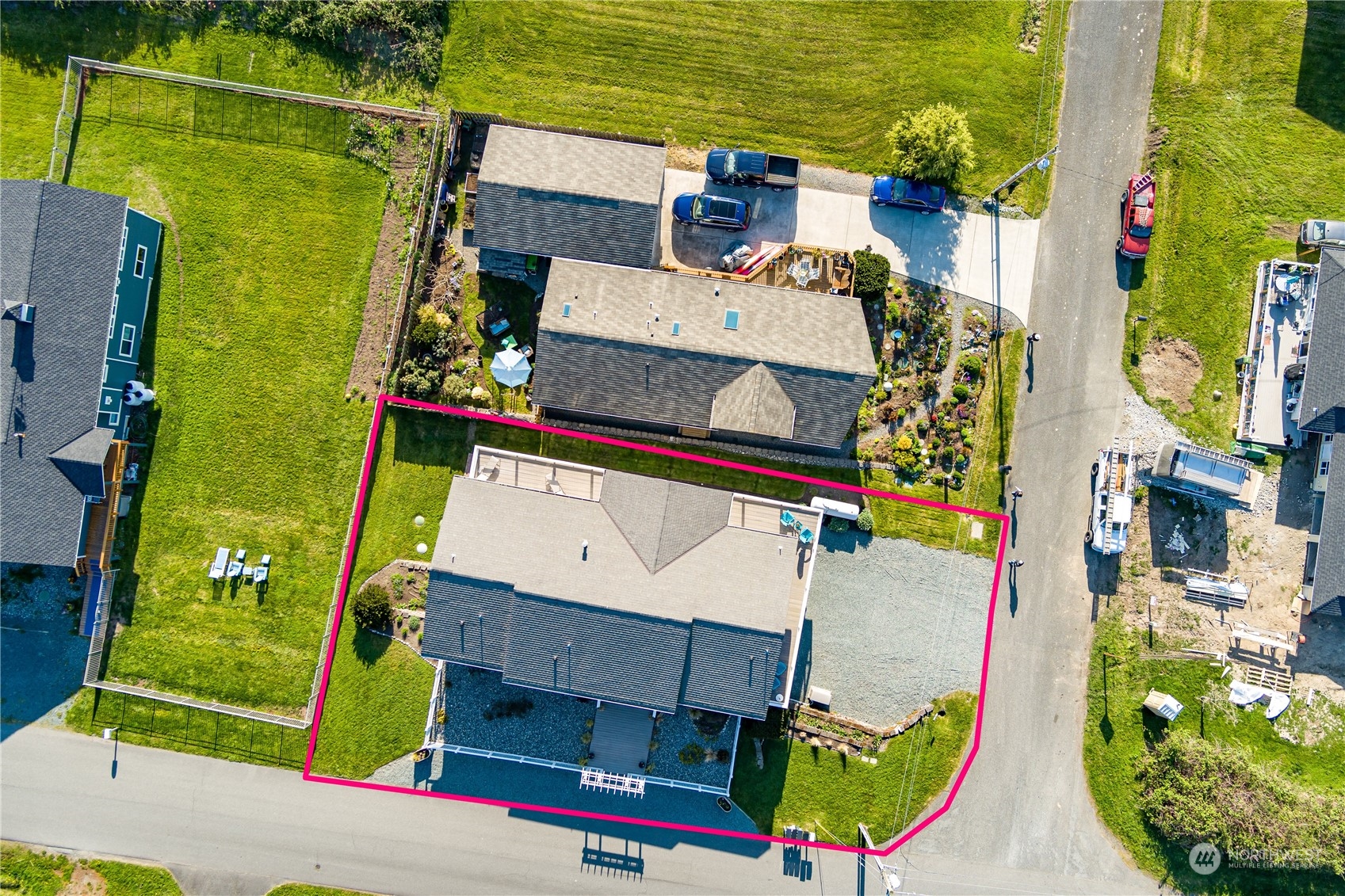 246 Lighthouse Way Freeland, WA 98249 - Photo 37 of 40 an aerial view of a house with a swimming pool