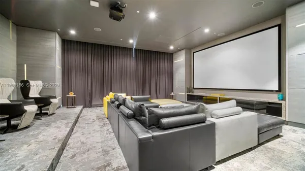 a room with furniture and a large window