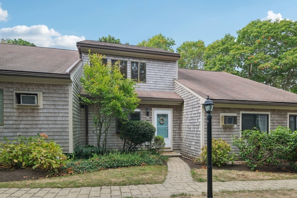 a house view with a garden space