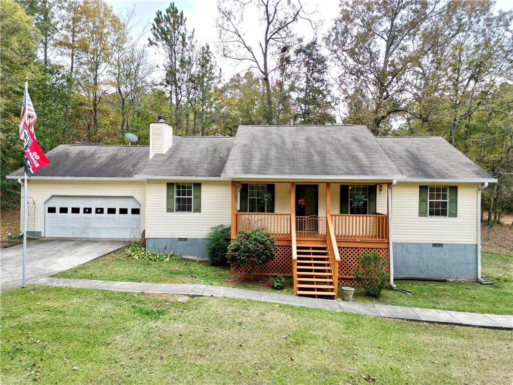 20 View Drive Southeast Rome, GA 30161 - Photo 1 of 1 a view of house with garden and tall trees