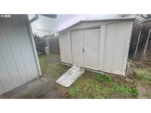 a black and white photo of a house
