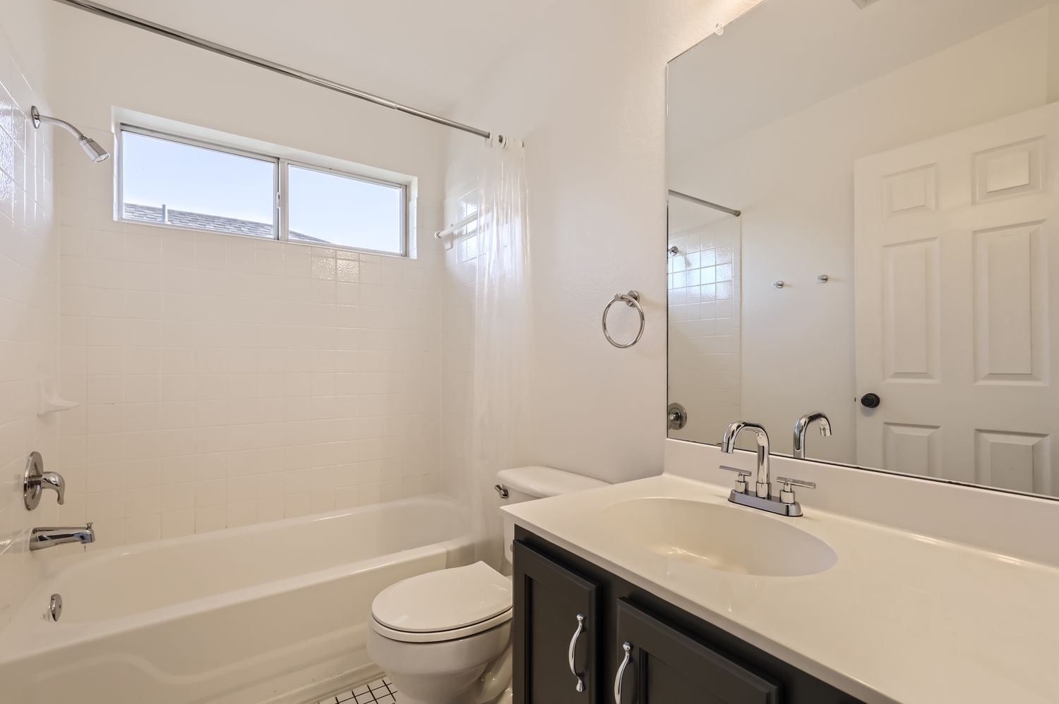 3805 Mankins Way Austin, TX 78728 - Photo 9 of 11 Bathroom featuring vanity and shower combination