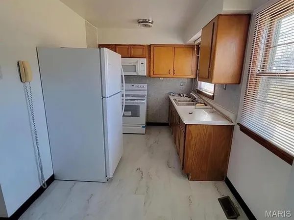 $1,000 | 1716 Loretta Avenue, East St. Louis, IL 62206