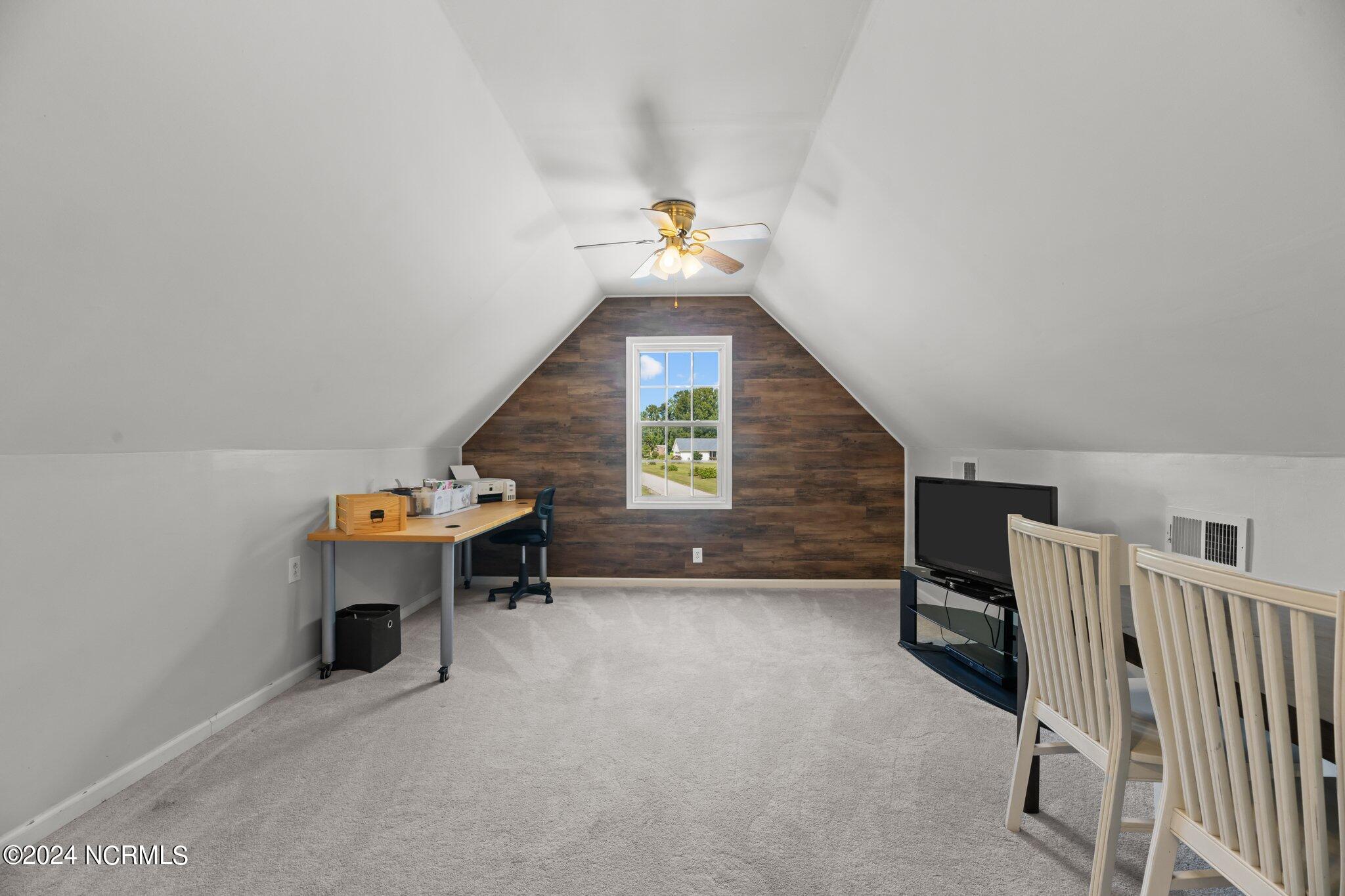1116 Tebo Road New Bern, NC 28562 - Photo 24 of 37 bonus room over garage featuring accent wall