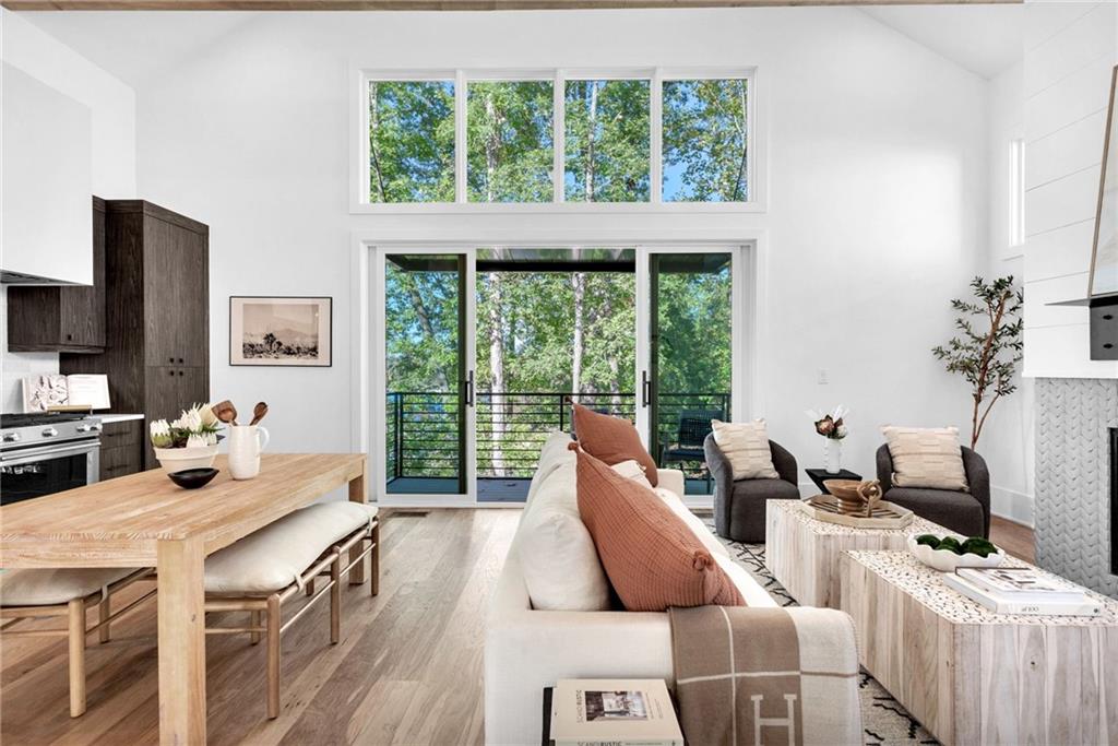 1250 Lupo Loop Chattahoochee Hills, GA 30268 - Photo 11 of 49 a living room with furniture and a flat screen tv