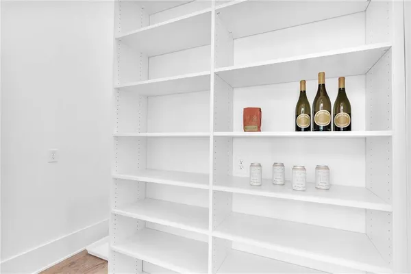 a bedroom with bed and a window