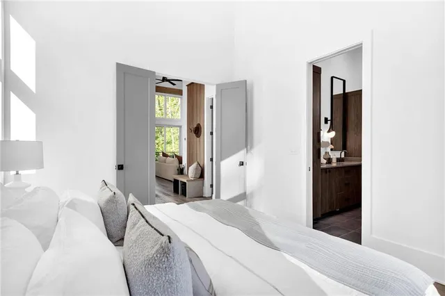 a bedroom with a bed and closet