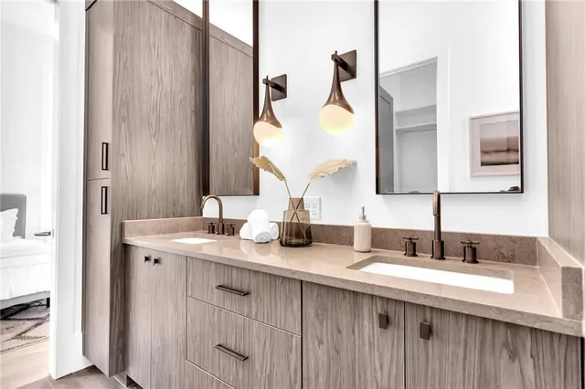 a bedroom with a bed and a night stand