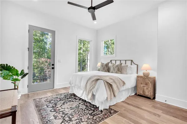 a bedroom with a bed and a table