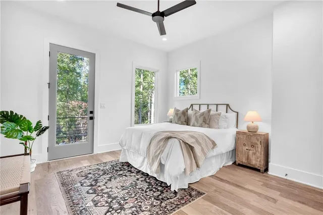 a bedroom with a bed and a table