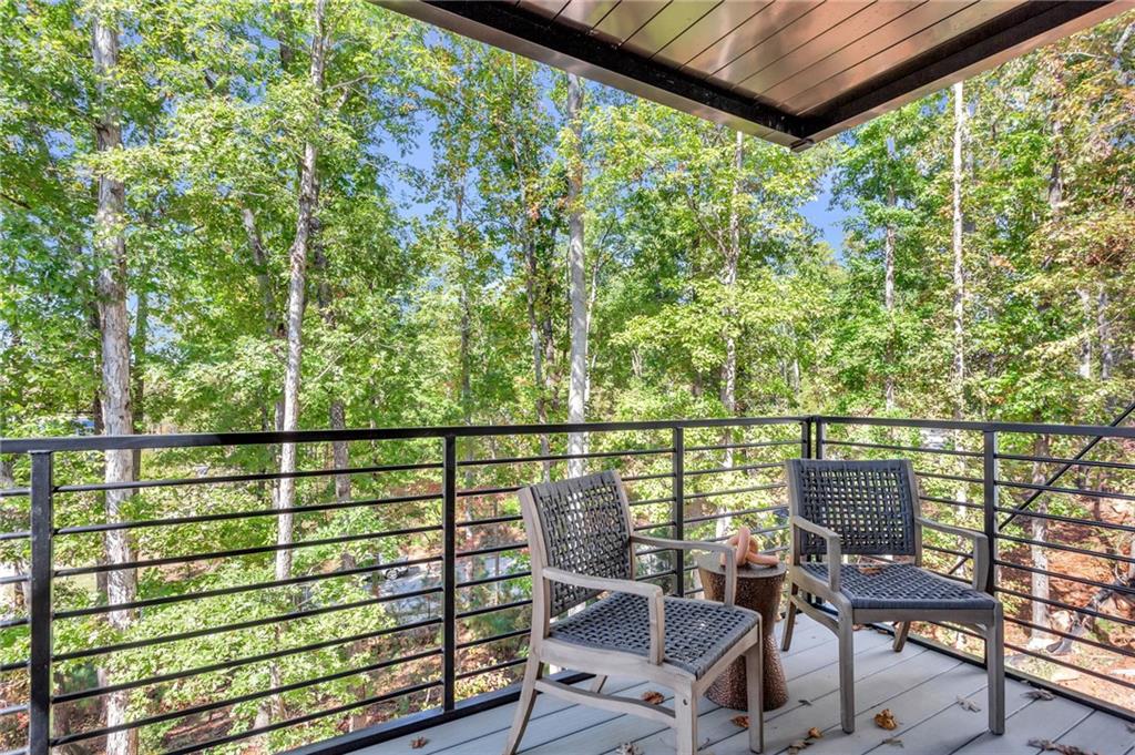 1250 Lupo Loop Chattahoochee Hills, GA 30268 - Photo 45 of 49 a view of a balcony with chairs