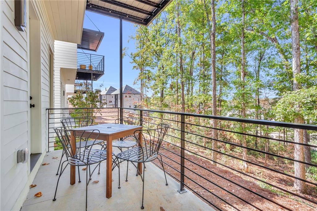 1250 Lupo Loop Chattahoochee Hills, GA 30268 - Photo 48 of 49 a view of balcony with chairs