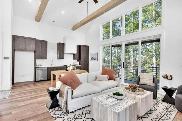a living room with furniture and a rug