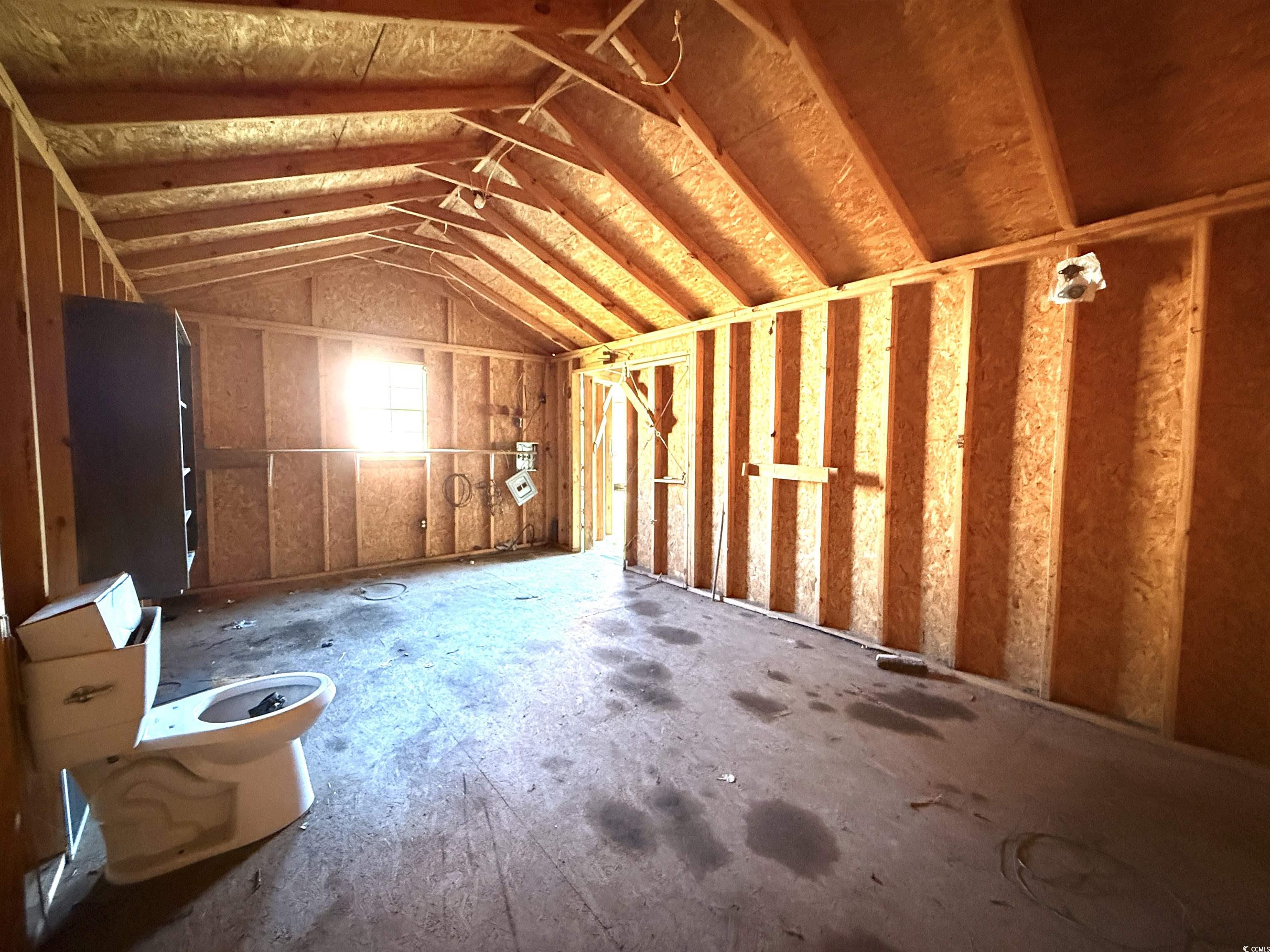 2765 County Line Road Andrews, SC 29510 - Photo 13 of 22 Larger Storage Building with attached covered shed