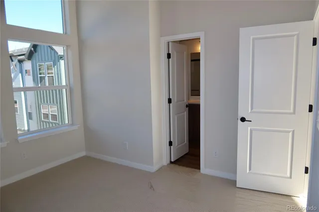 an empty room that has a window