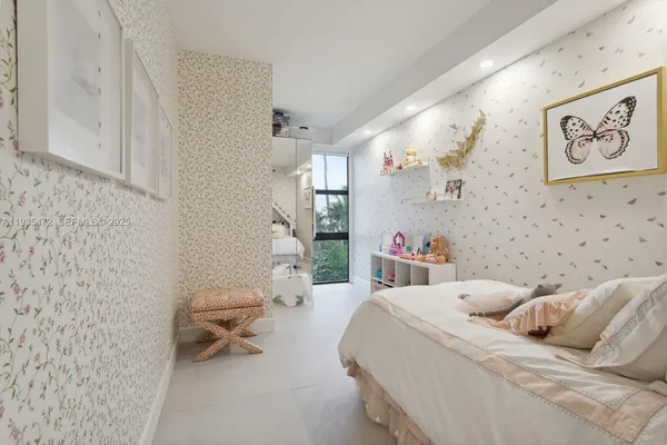 a bed room with a bed and a couch