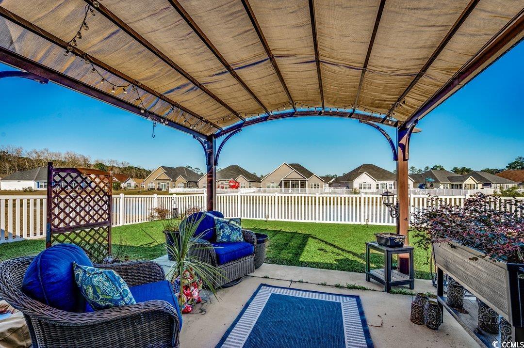 257 Leste Road Myrtle Beach, SC 29588 - Photo 23 of 35 View of patio featuring outdoor lounge area with P