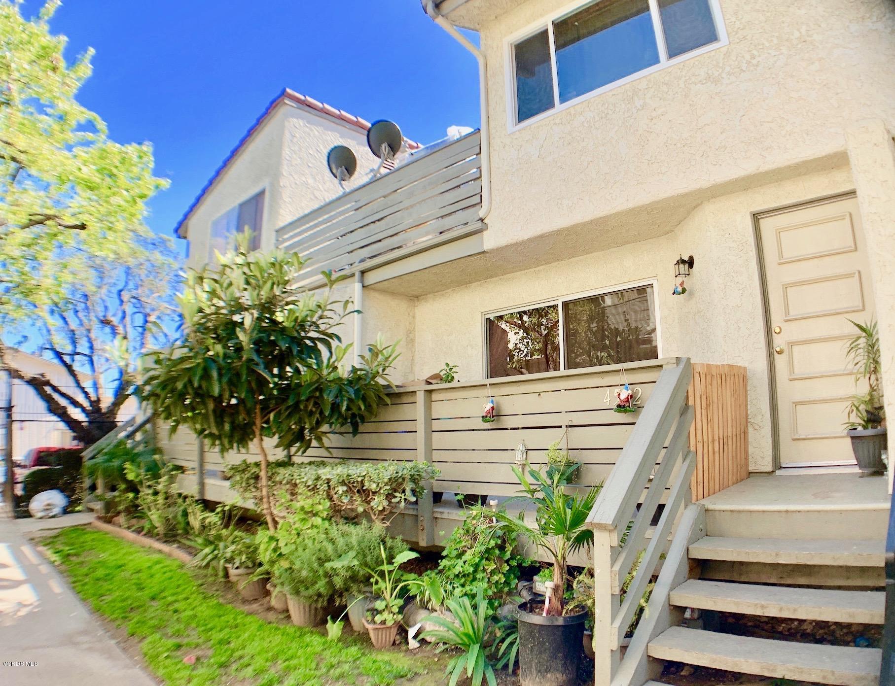 4562 Saviers Road Oxnard, CA 93033 - Photo 1 of 29 a front view of a house with a yard